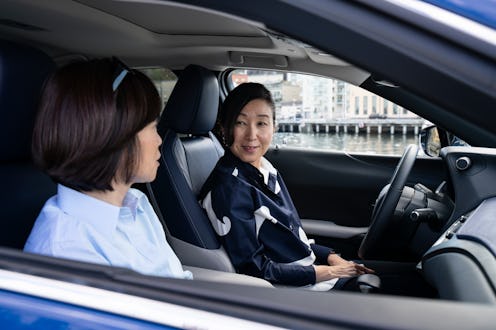 Chika Kako giving interview to Suzanne McKenzie while sitting in the Lexus