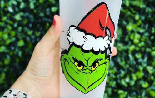 A 'Grinch' Starbucks cup available on Etsy.