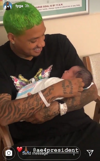 AE holding his baby with Amber Rose Slash Electric in the hospital
