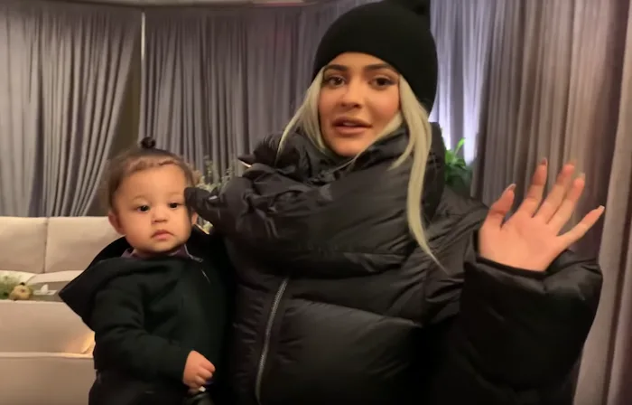 Kylie Jenner and her daughter, Stormi, wear matching black jackets.