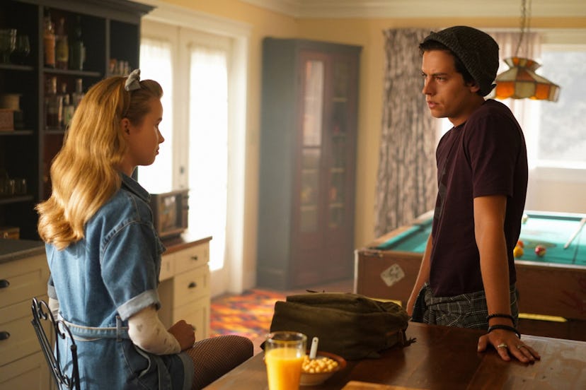 Trinity Likins as Jughead's sister Jellybean and Cole Sprouse as Jughead in Riverdale Season 4