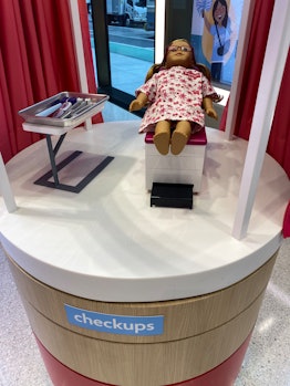 American Girl doll receiving health and wellness checkup at the hospital in NYC 