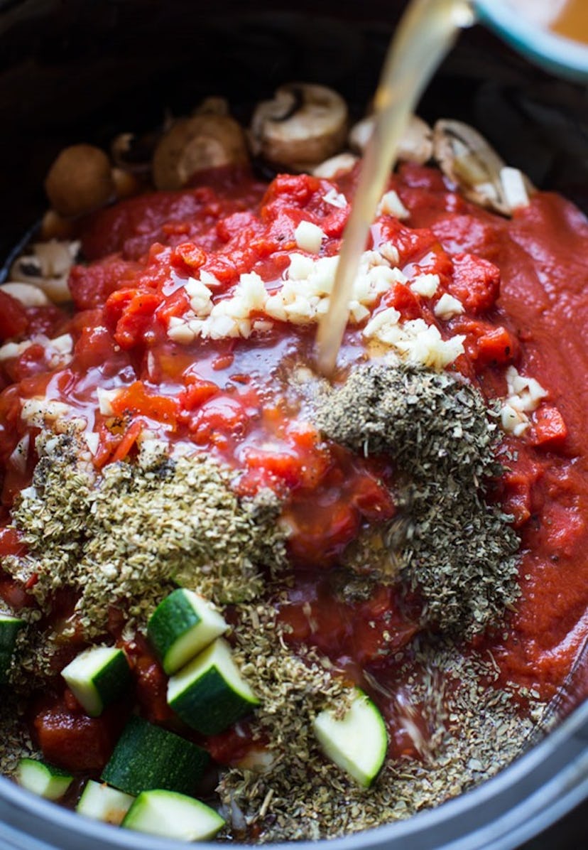 zucchini, onion, tomato sauce, and spices in slow cooker