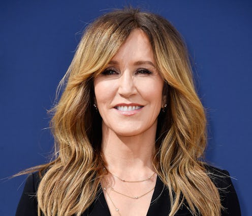 Felicity Huffman reported to prison for her role in the college admissions scandal