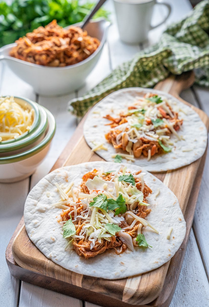 slow cooker puulled chicken tacos with other food items
