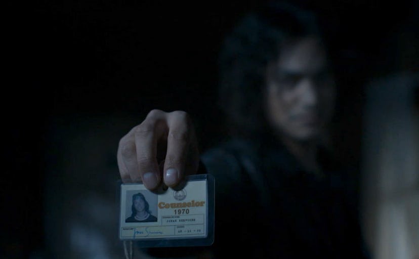 Zach Villa as Night Stalker Richard Ramirez holding the Hitchhiker's ID in 'AHS: 1984'