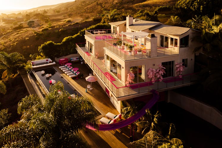 The exterior of Barbie's Malibu Dreamhouse is painted golden during a Californian sunset.