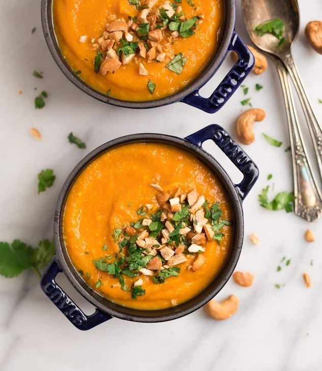 A bowl of carrot soup with ginger.