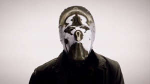 Looking Glass's mask reflects a Rorschach symbol while interrogating a pilot in HBO's Watchmen. 