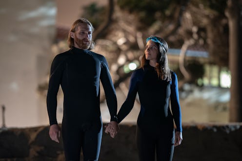 Dud (Wyatt Russell) and Liz (Sonya Cassidy) hold hands in the Season 2 finale of 'Lodge 49.'