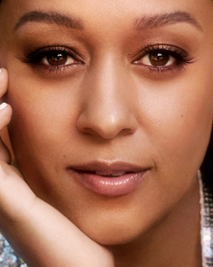 Tia Mowry poses for Romper's Holiday Issue 2019.