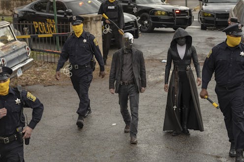 Tim Blake Nelson as Looking Glass and Regina King as Sister Night in HBO's Watchmen