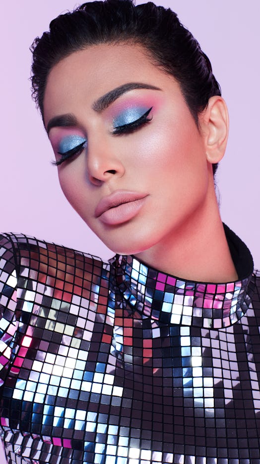 Huda Beauty's Mercury Retrograde palette features purple, pink, and blue tones.