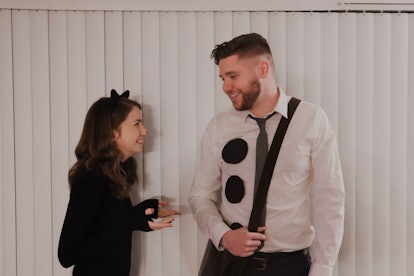 A couple is dressed up like Jim and Pam from 'The Office' for a last-minute Halloween costume.