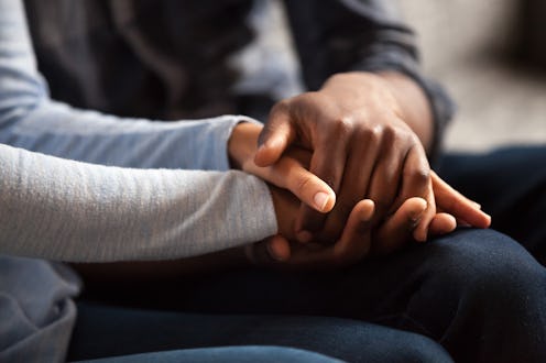 Two people hold hands. Breast numbness after a mastectomy is way too common, and Dr. Anne Peled want...