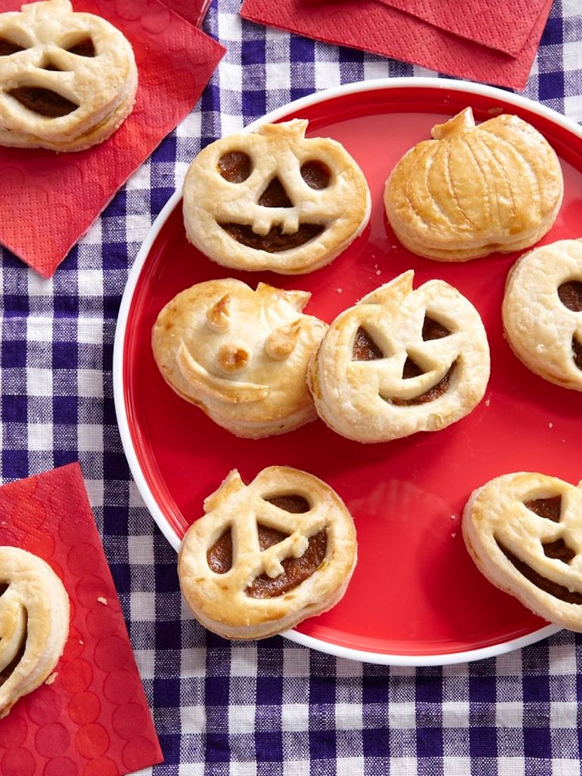 Use store-bought pumpkin pie filling to make these Halloween pumpkin tarts.