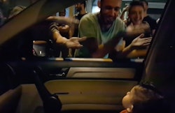 A group of demonstrators sing "Baby Shark" to a toddler stuck in traffic amid protests in Lebanon.