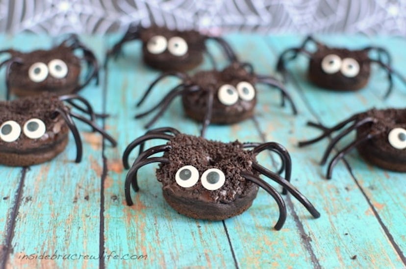 Chocolate pumpkin spider donuts are a delicious Halloween snack for the classroom. 