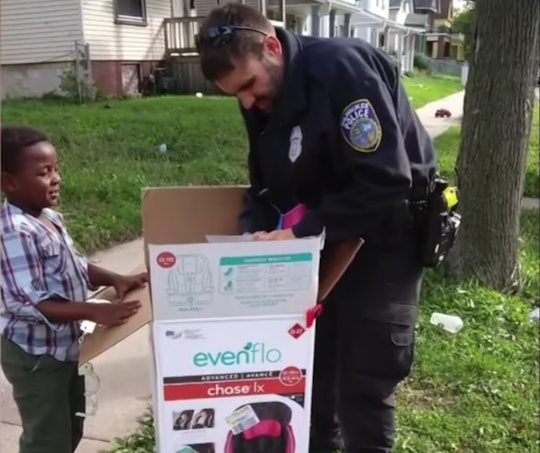 A Milwaukee police officer bought car seats for a mom who was unable to afford them herself.