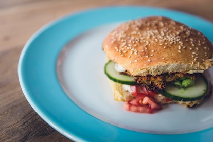 A veggie burger on a plate. Vegetarian and vegan diets may change the body in ways that help with he...