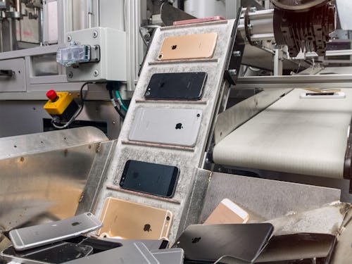 Apple's Daisy bot disassembles iPhones to help recycle materials. 