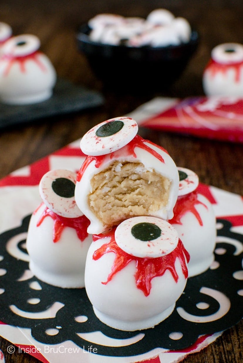 Peanut butter zombie eyeballs are a no-bake Halloween snack for the classroom. 