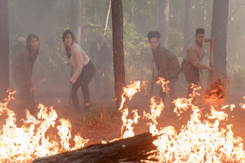 The Walking Dead cast puts out a fire caused by a satellite