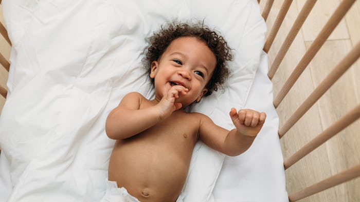 Baby Laughing in a Crib