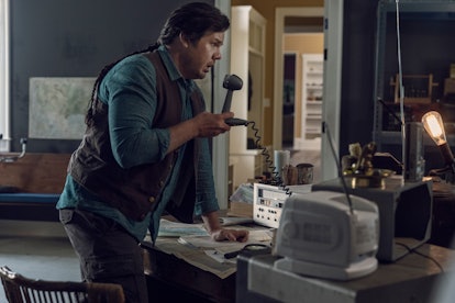 Eugene using his radio on The Walking Dead