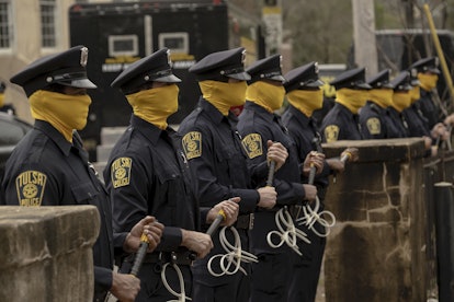 Masked police officers under the Redford administration in Watchmen