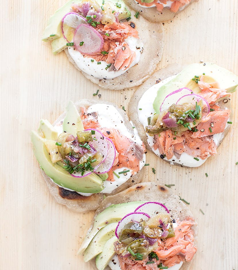 The salmon tostada tomatillio salsa recipe from What's Cooking Good Looking creates a beautiful, hea...