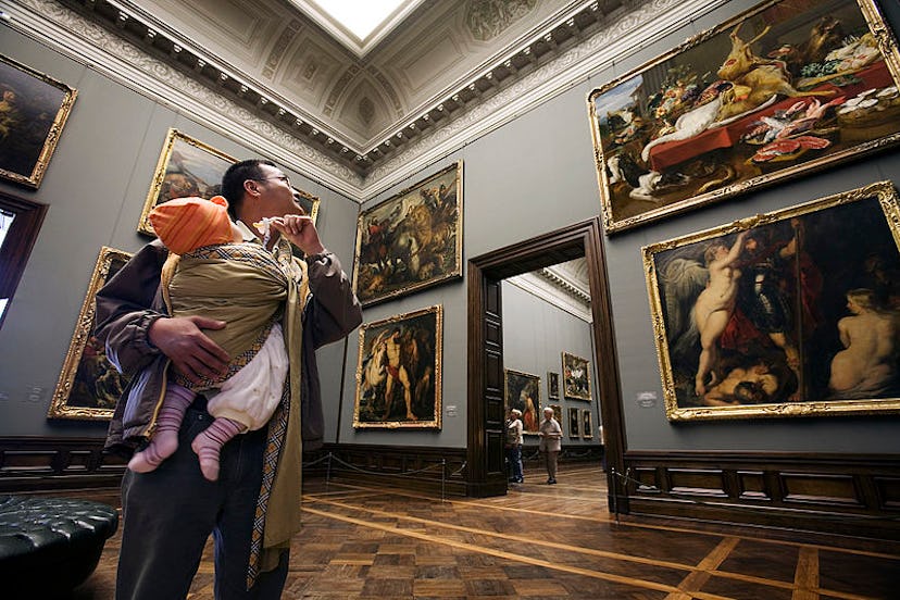 A father takes a child to a museum. Daddy quotas, or periods of non-transferable paternity leave, he...