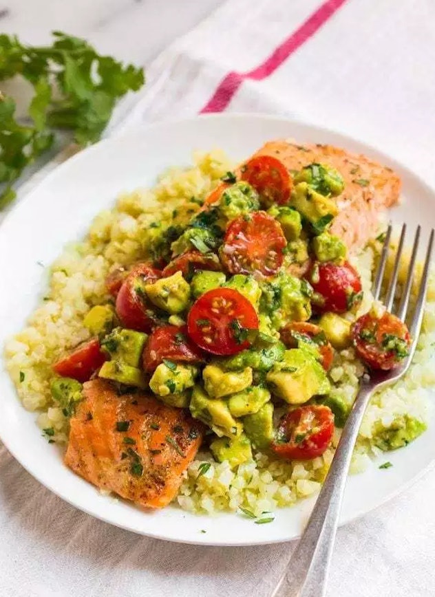 Whole30 Baked Salmon with Creamy Avocado Sauce recipe from Well Plated By Erin is a fast, delicious,...
