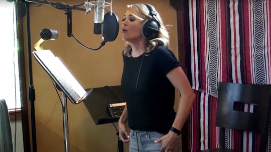 Carrie Underwood singing in the video for The Champion ft Ludacris