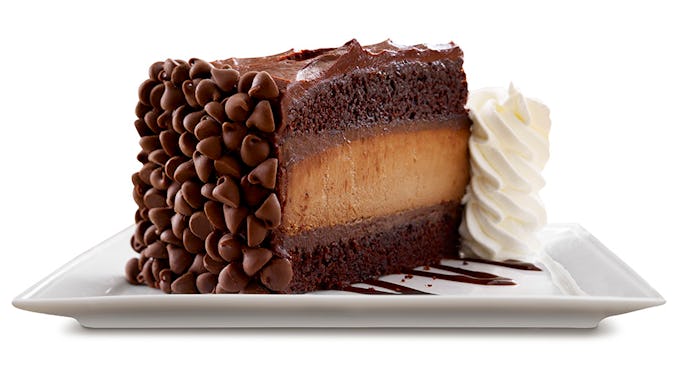 A piece of Hershey's cheesecake sits on a platter.