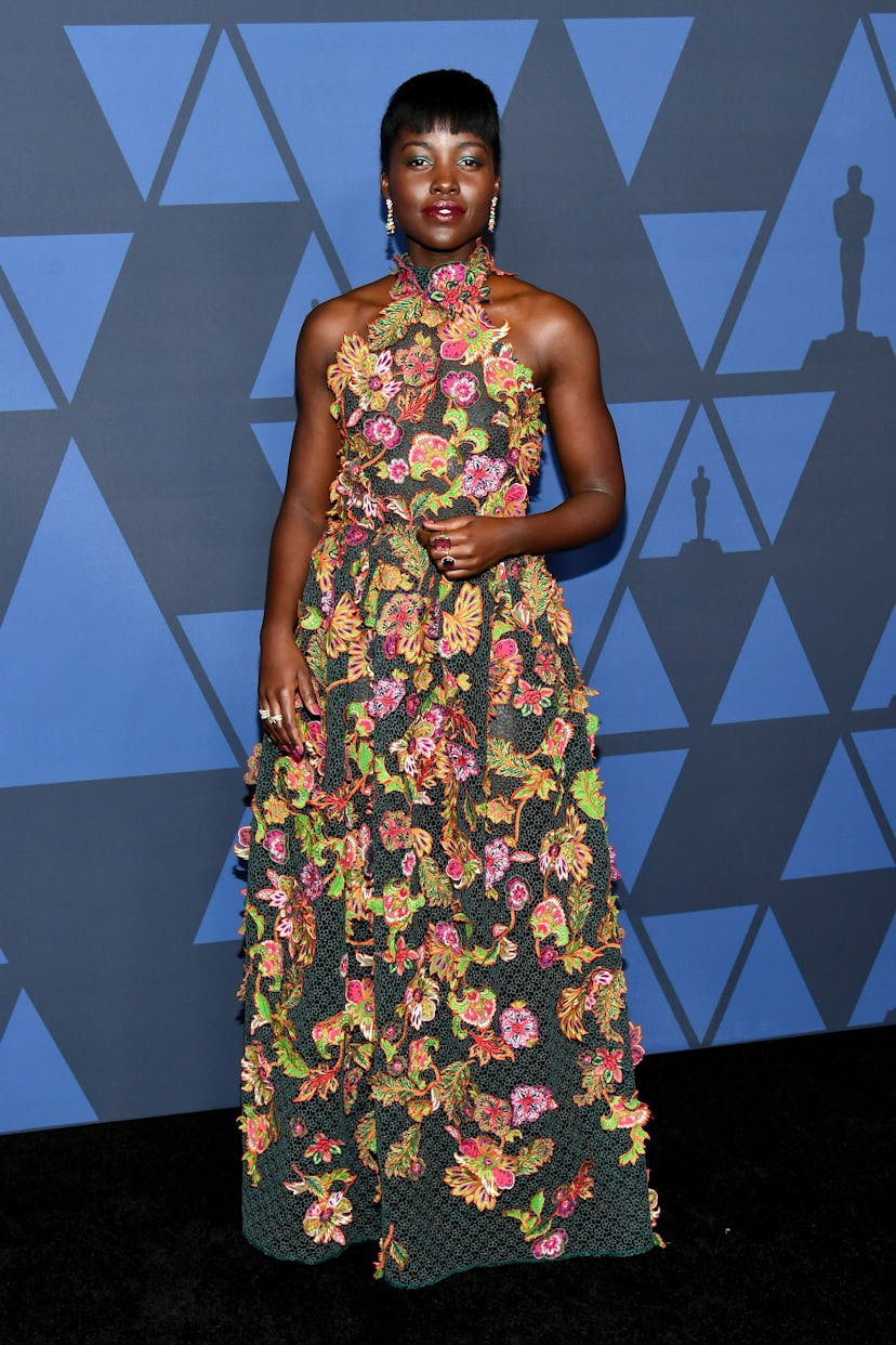 Lupita Nyong'o in an embroidered, high-neck gown from Givenchy's Spring/Summer 2020 at the 2019 Gove...