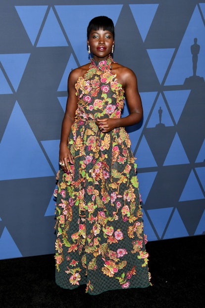 Lupita Nyong'o in an embroidered, high-neck gown from Givenchy's Spring/Summer 2020 at the 2019 Gove...