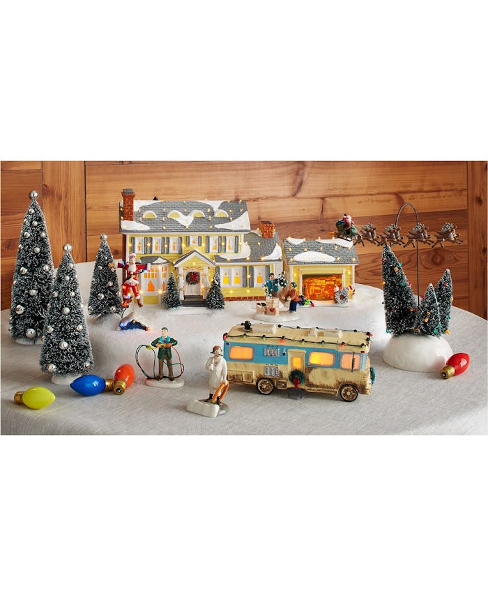 Image of National Lampoon's Christmas Vacation Village set up on faux snow background