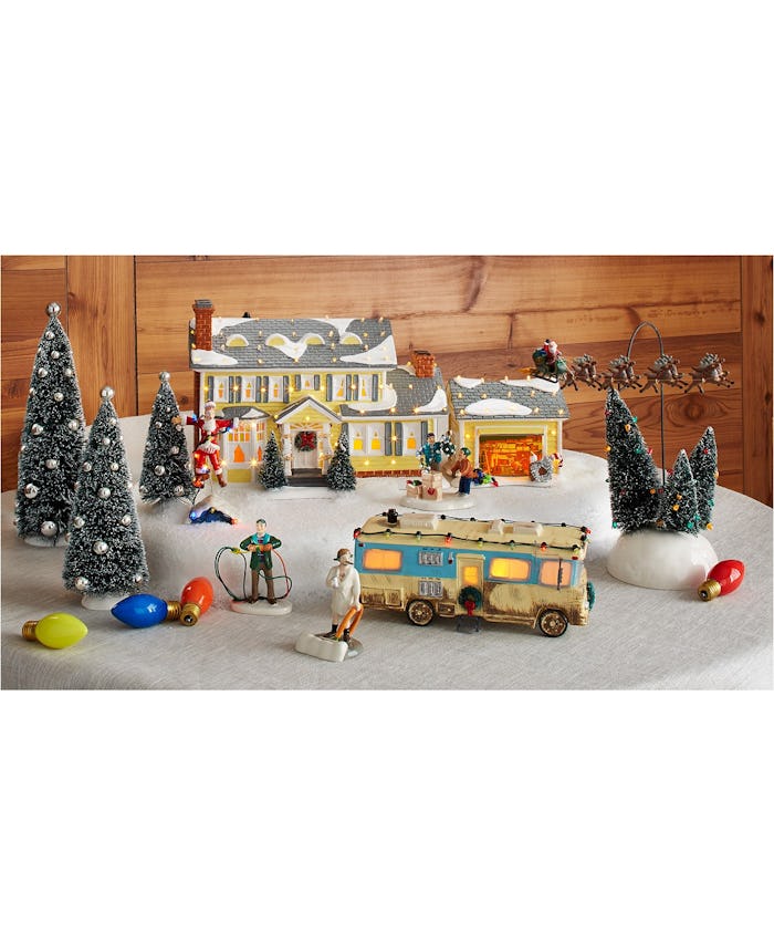 Image of National Lampoon's Christmas Vacation Village set up on faux snow background