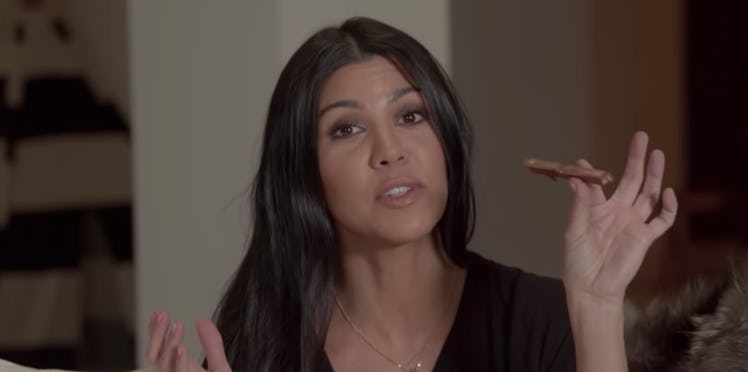 Kourtney Kardashian eating a Kit Kat