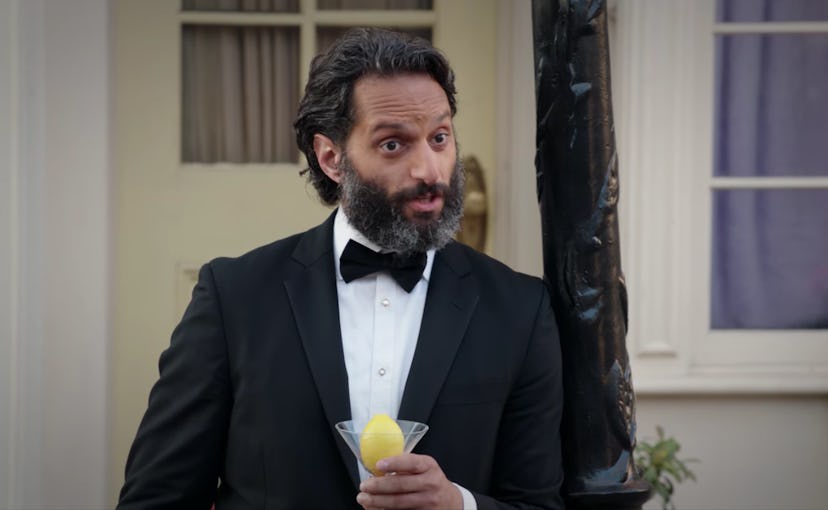 Jason Mantzoukas as Derek holding a lemon martini in 'The Good Place'