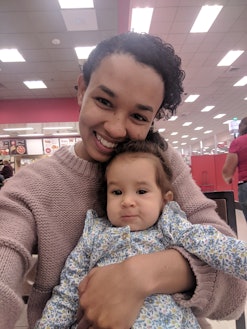 Mom and toddler cuddle in Target