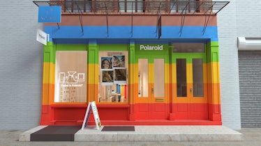 The front of the Polaroid Pop-Up Lab in NYC is rainbow-colored.