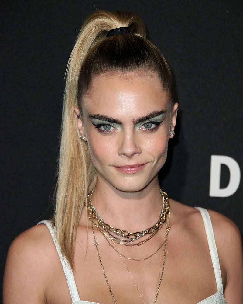 Cara Delevingne wore a minty version of this fall 2019 eyeshadow trend