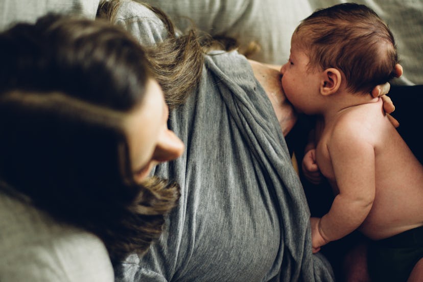 nipple shields caucasian woman breastfeeding newborn nursing baby