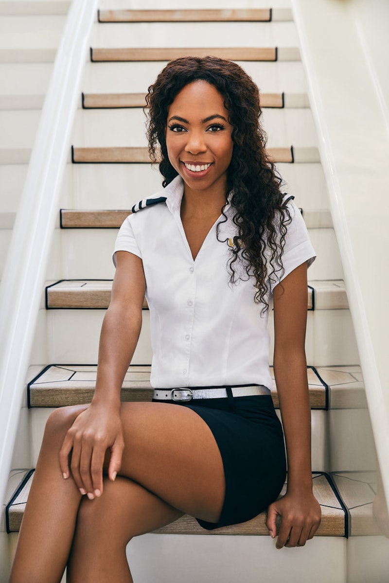 Simone from 'Below Deck' Season 7 poses on a yacht.