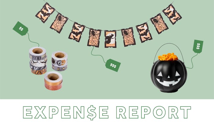 Halloween hanging decorations, a black carved pumpkin and candles with "expense report" written belo...