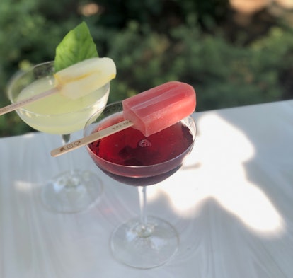 These limoncello and sangria cocktails are Instagrammable Disney drinks that come with popsicles on ...
