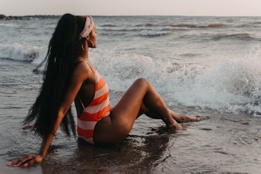 This woman in a striped bathing suit on the beach might dress up like a 'Bachelor in Paradise' conte...