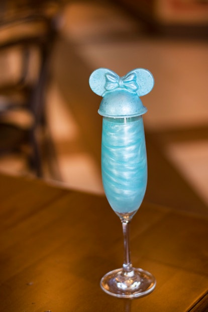 The "Arendelle Aqua Cuvée" is an Instagrammable Disney drink with a Minnie Mouse topper.
